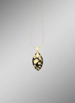 Anhänger mit Onyx, beh. und Bergkristall mit Blattgold-Triplette