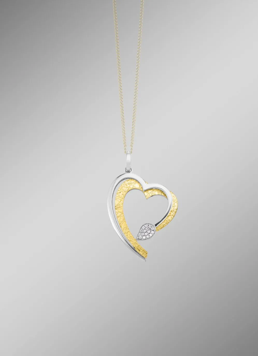 Herz-Anhänger in Bicolor mit synth. Zirkonia