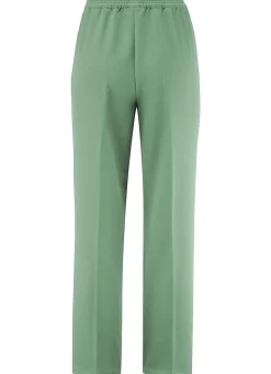 Hose mit schmückendem Zierteil