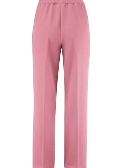 Hose mit schmückendem Zierteil